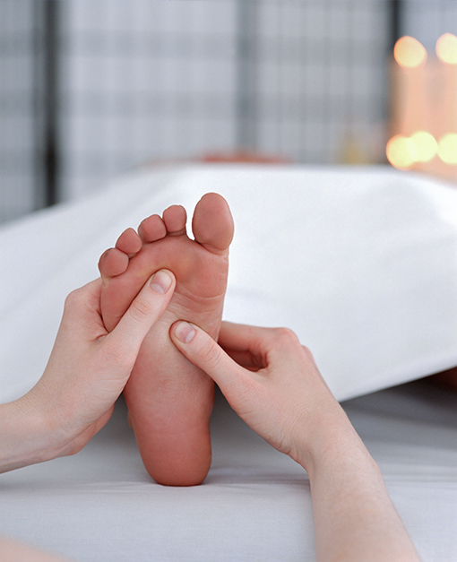 Person receiving a foot massage