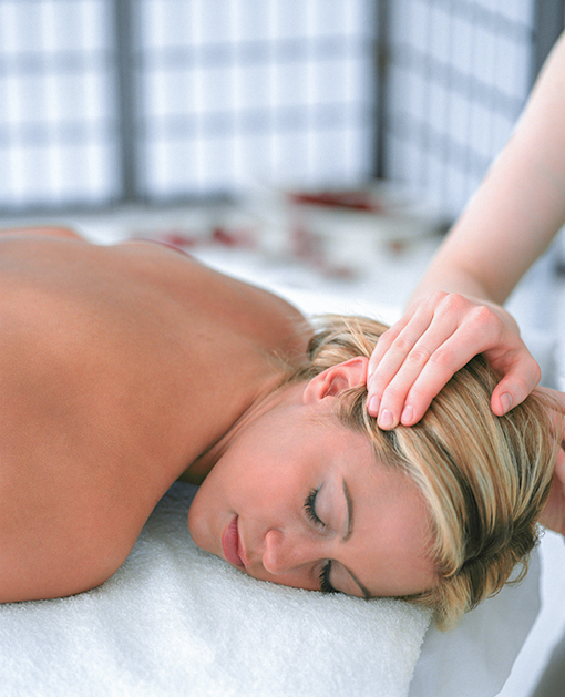 Person receiving Indian head massage